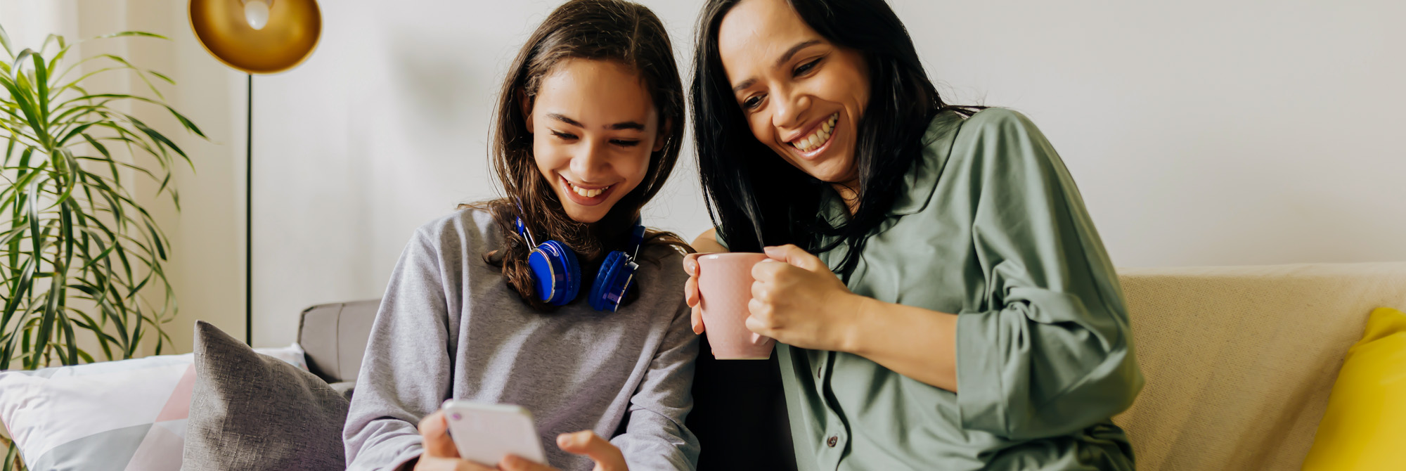 Mother and daughter spending time with IB Education at home.